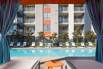 Pool with open-air cabanas and spa area with wi-fi hotspot